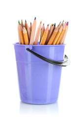 Colorful pencils in pail isolated on white