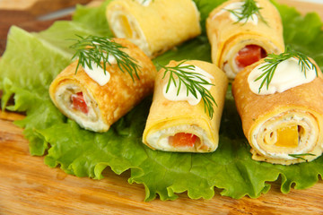 Egg rolls with cheese cream and paprika,