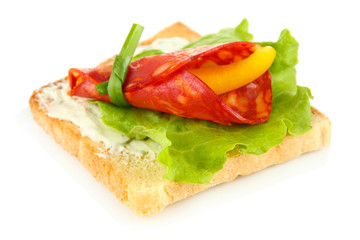 Salami rolls with paprika pieces inside,