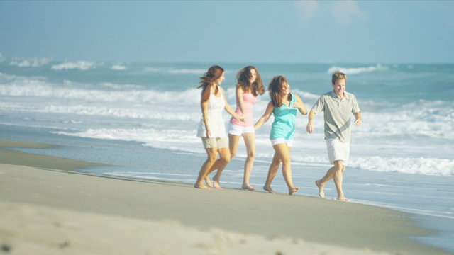 Casual Dressed Caucasian Family Outdoors Together Beach