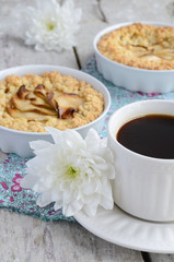 Breakfast with coffee, apple tart and white flowers