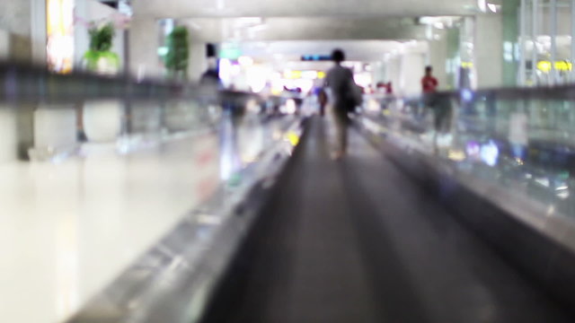 Moving Walkway, Out of focus used in order to give anonymous