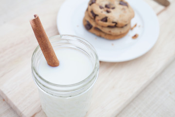 A Jar of Milk with Cookie