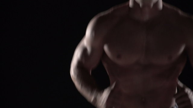 Muscular Man Running Towards Camera, Torso Shot Right