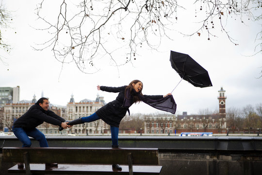 Couple facing a storm