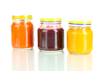 Baby puree in jars isolated on white
