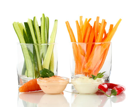 Assorted raw vegetables sticks isolated on white
