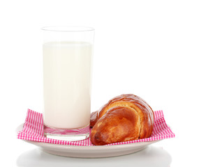 Croissant and glass of milk isolated on white