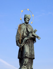 Fototapeta na wymiar Praga - Pomnik Jana Nepomucena na Most Karola i Hradczany