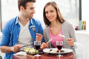 Couple having meal in restaurant