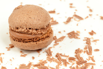 Sponge drop from cocoa dough with cream and crumbs of chocolate