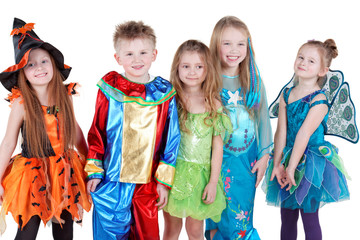 Smiling children in carnival costumes  stand in line
