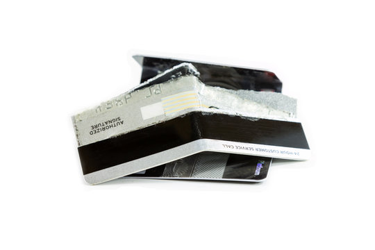 Damage credit cards on white background