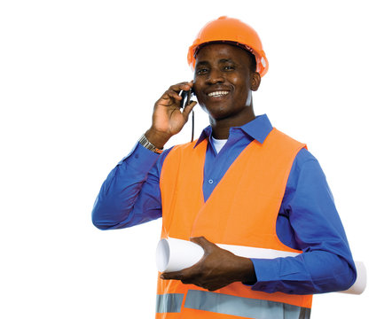 Portrait of a man  talking on the phone and holding a draft
