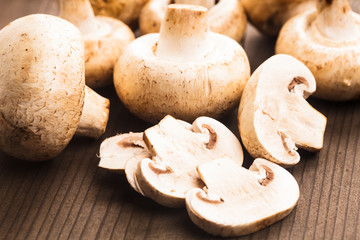 Champignons on the wooden table