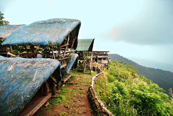 Open huts overlooking a steep cliff in the Philippines