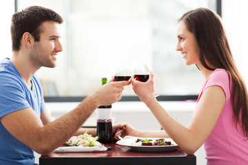 Couple having toast in restaurant