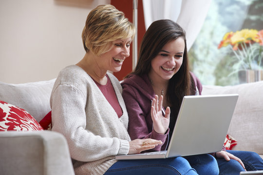 Mother And Daughter On Laptop