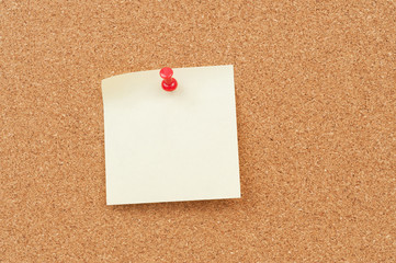 Thumbtack and note paper
