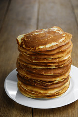 Pile of pancakes in the white plate