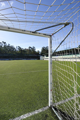 football or soccer goal and blue sky in the stadium