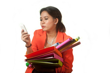 Busy Asian business woman with a folders and colorful papers.