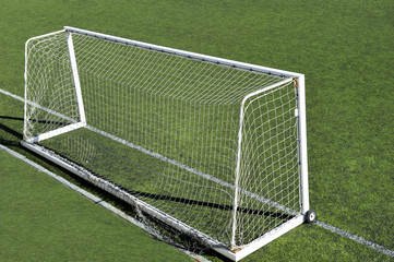 football or soccer goal and blue sky in the stadium