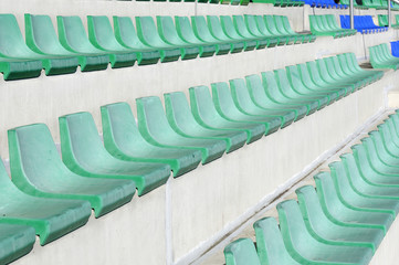 Fototapeta premium In the stadium, stands and seats in green