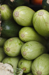 stall of zucchini at the market