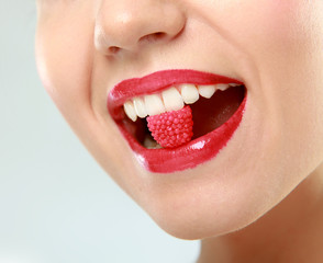 woman sucking cute sweet candy closeup