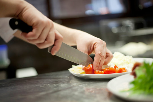 man cutting vegetables 