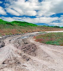 clouds and dirt road