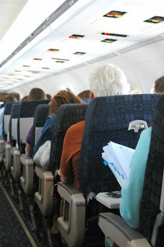 Airplane passengers.