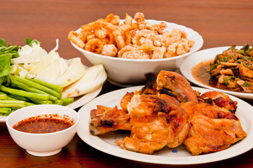 The grilled chicken and fried pork in Thai style