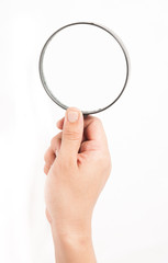 Magnifying glass in hand isolated on white background