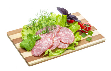 Fototapeta premium Sausages with salad and basil