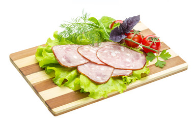 Sausages with salad and basil