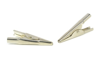 A set of crocodile clips on a white background