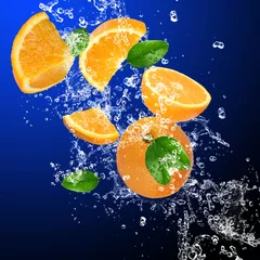 Papier Peint photo Éclaboussures deau Oranges fraîches dans les éclaboussures d& 39 eau