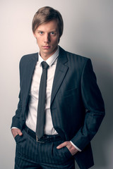 guy in black expensive suit