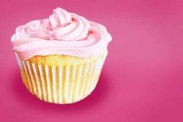 Vanilla cupcake with pink frosting