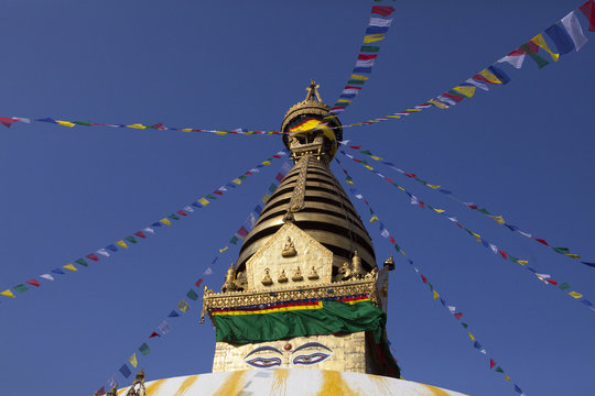 Stupa of the swayambhunath temple with blue sky in kathmandu
