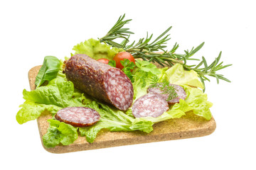 Salami with rosemary, salad and tomatoes