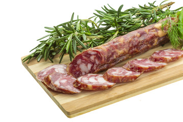 Salami with rosemary, basil and tomato