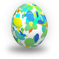 Uovo di pasqua con cerchi verdi colorati su fondo bianco
