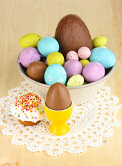 Composition of Easter and chocolate eggs and simnel