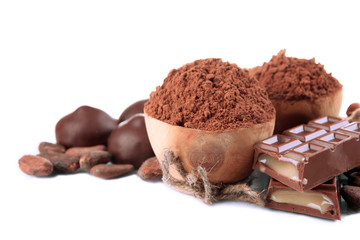 Composition of chocolate sweets, cocoa and spices, isolated