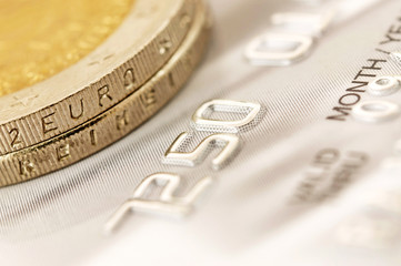 Euro coins with credit card - 50723915