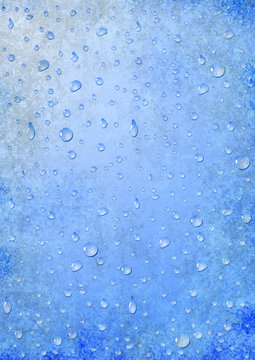 Drops of water on a blue grunge background