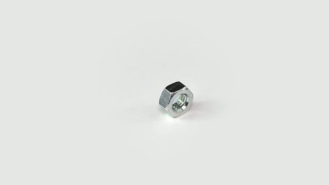 Nut rotates on a white background